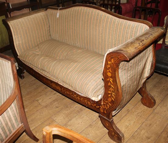 A 19th century Dutch marquetry inlaid walnut boat shaped settee, W.5ft 10in. D.2ft 1in. H.3ft 3in.